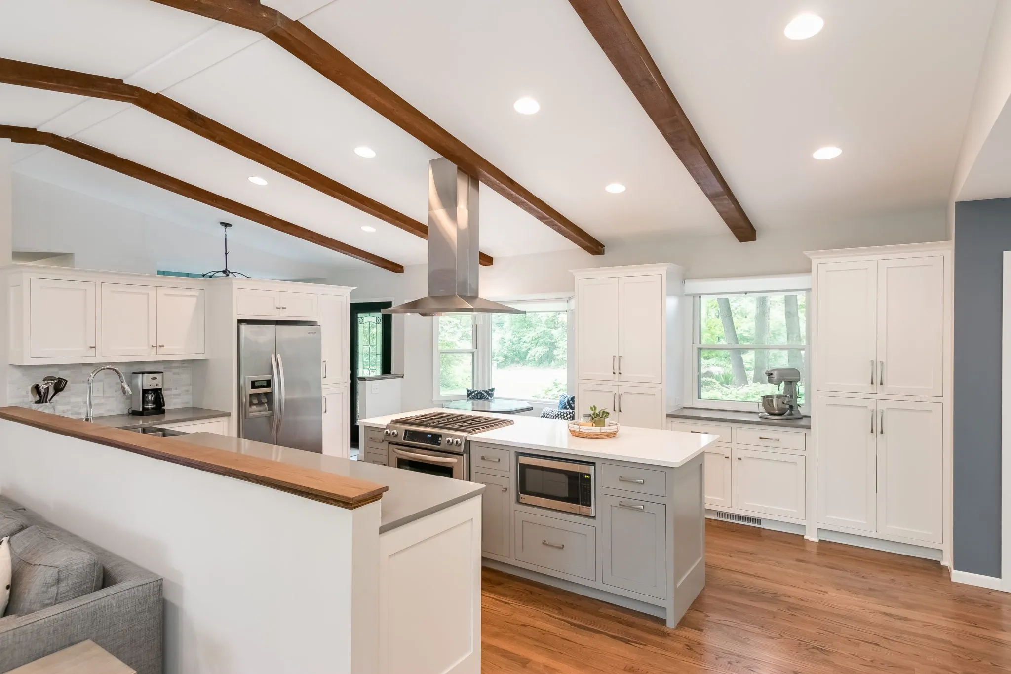 open concept kitchen | wood ceiling beams | island | fbc remodel