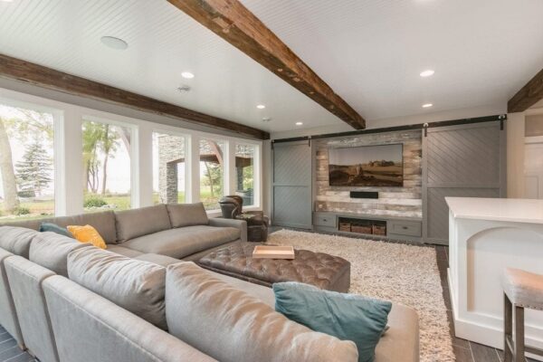 basement remodel with home theater and sliding barn doors | fbc remodel