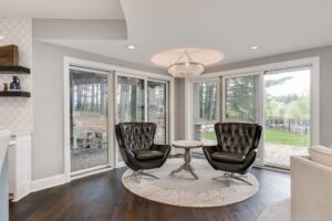 basement remodel with sitting area and open ceiling to floor windows | fbc remodel