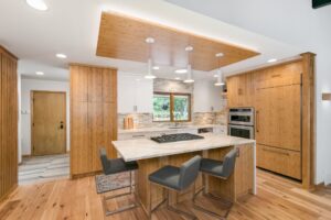light wood open floor plan kitchen | kitchen island | fbc remodel | finished basement value