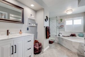 dark accent bathroom | white vanity, white tile, white bath, white shower | mahogany towels | fbc remodel